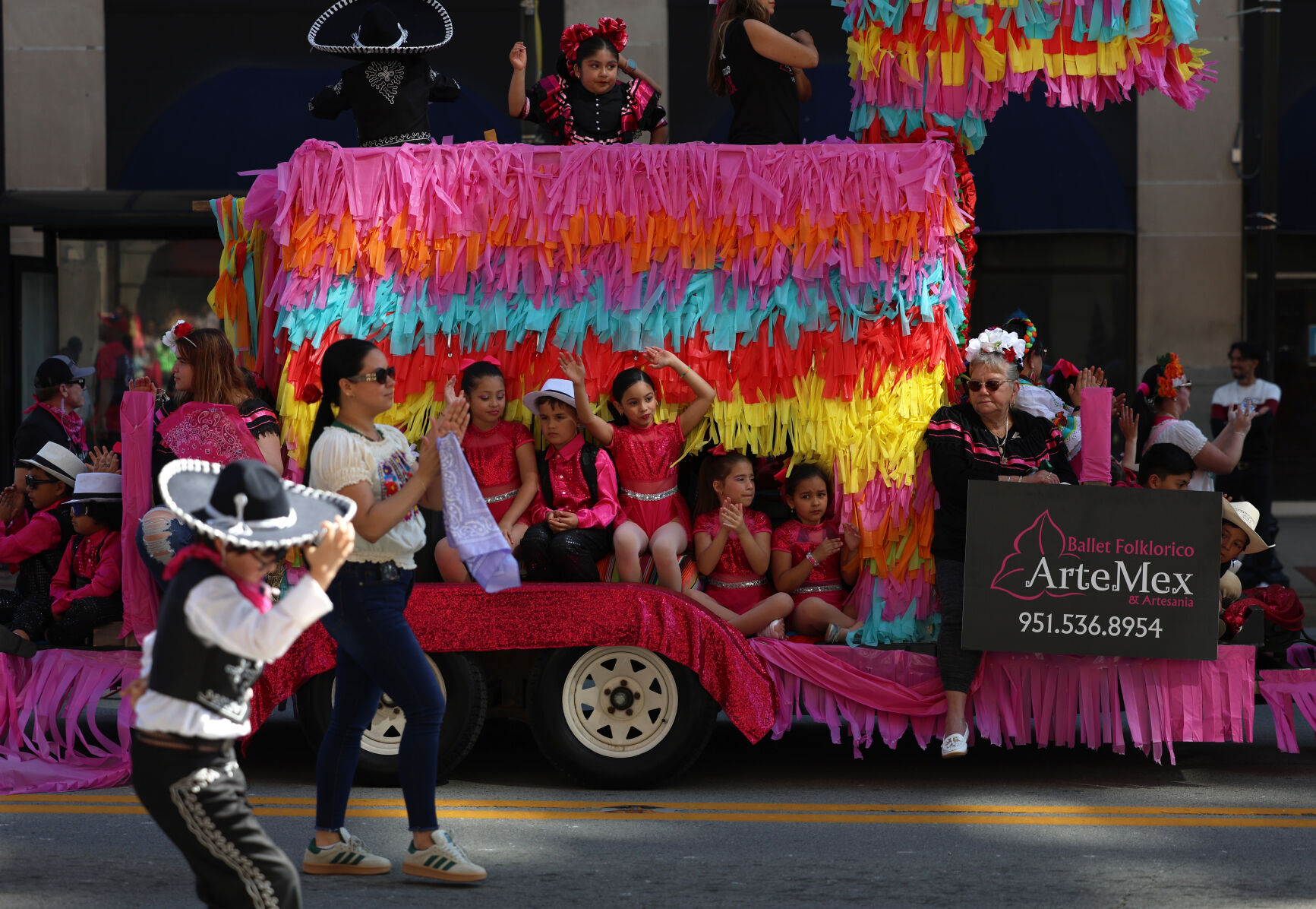 Group rides in truck at Pegasus Parade.JPG